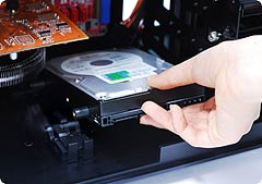 The floor of the chassis can hold up to two hard drives