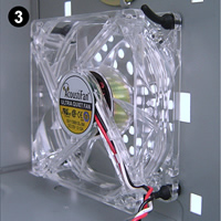 Fitting AFM02 antivibration ultra-soft fan mounts. Image 3 shows a clear fan anti-vibration mounted, with the fan mounts pulled through the fan mounting holes on the fan.